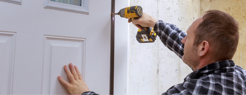 Expert carpentry repairing a wooden door frame in Austin