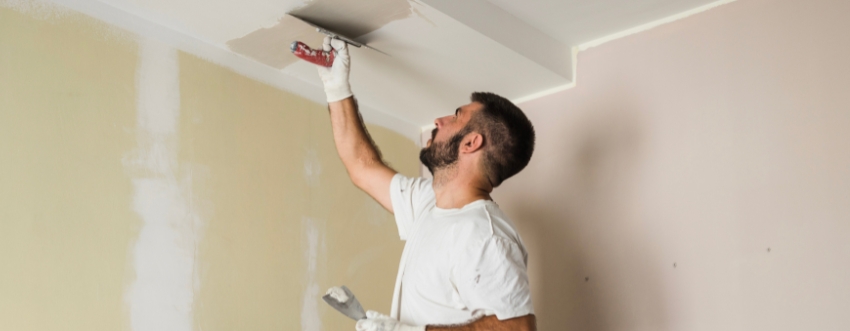 Close-up of a painting project, showing clean lines on trim